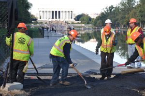 Shoveling at the World War II Memorial